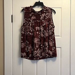Women’s medium sleeveless top with high neck